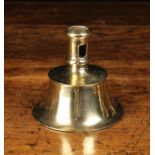 A 16th Century Brass Capstan Candlestick.