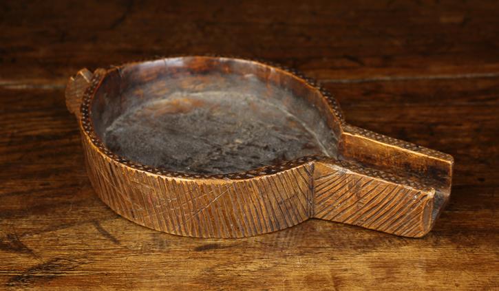 A 19th Century Scratch Carved Fruitwood Spouted Drip Tray, - Image 7 of 7