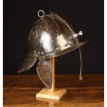 A Cromwellian Style Painted Iron Lobster-tail Helmet (A/F).