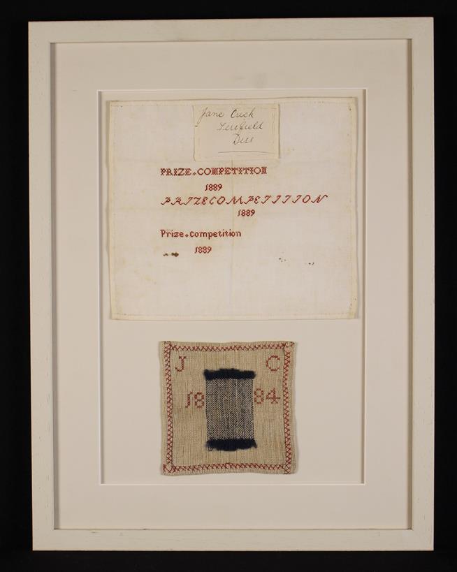 A Small 19th Century Darning Sampler dated 1884 and initialed JC with folded-over & cross-stitched