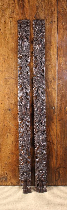 A Pair of Long 17th Century Style Pierced Rosewood Swags elaborately carved with pendant garlands