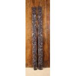 A Pair of Long 17th Century Style Pierced Rosewood Swags elaborately carved with pendant garlands