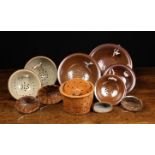 A Group of 19th Century Stoneware Colanders and Culinary Moulds and a perforated earthenware