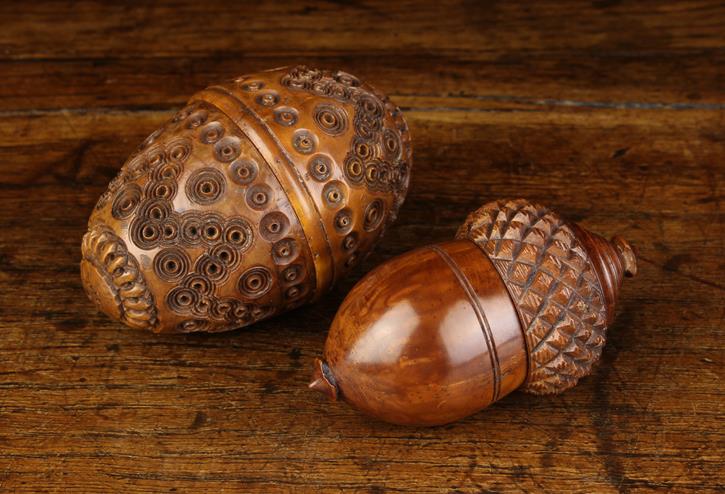 Two Fine Early 19th Century Coquilla Nut Containers: One in the form of an egg elaborately