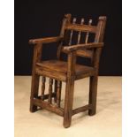 A 17th Century Spanish Walnut Armchair of fine colour and patination.