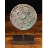 A Chinese Bronze Burial Mirror, Tang Dynasty Circa 618-907 A.D.