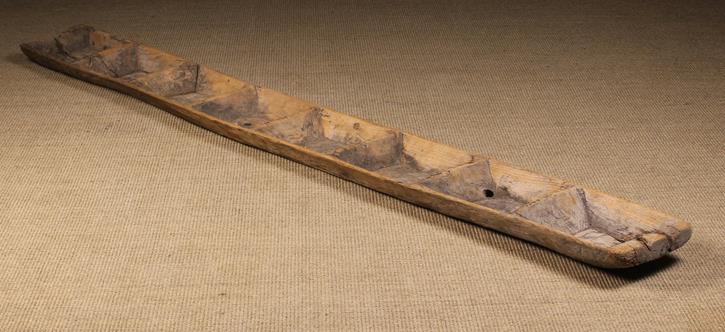 A Long Rustic Dug Out Pine Trough with divides, 9" (23 cm) wide, 81" (206 cm) in length.