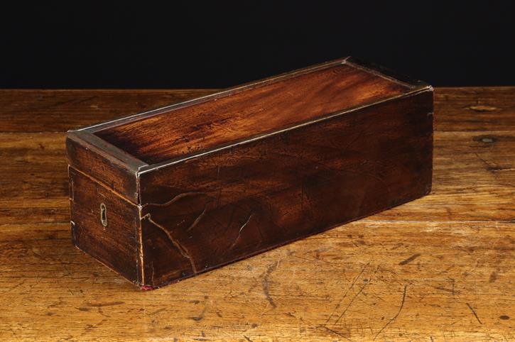 A 19th Century Mahogany Games Box of rectangular form with a brass lined keyhole to one end. - Image 4 of 4