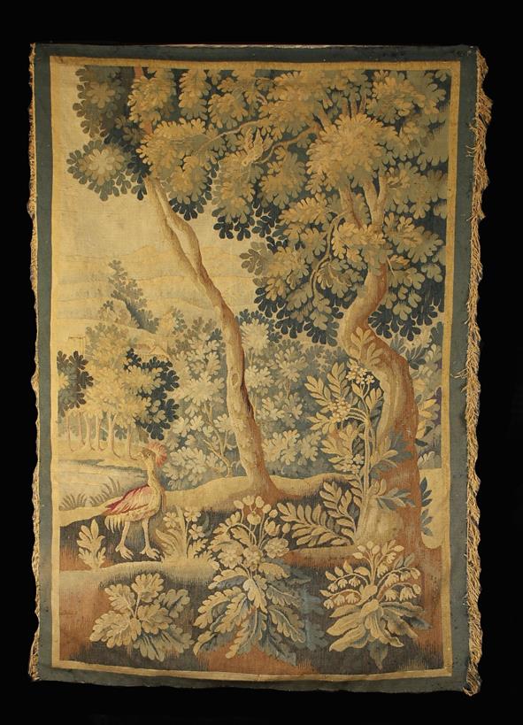 A Late 17th/Early 18th Century Verdure Tapestry Wall Hanging depicting a crested bird amongst