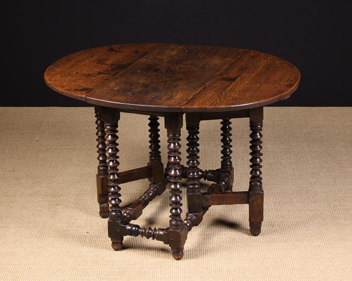 A Small 17th Century Oak Gateleg Table.