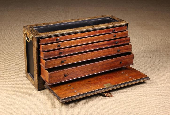 A Georgian Oak Framed Travelling Carpenter's Box. The ends fitted with brass swing handles.