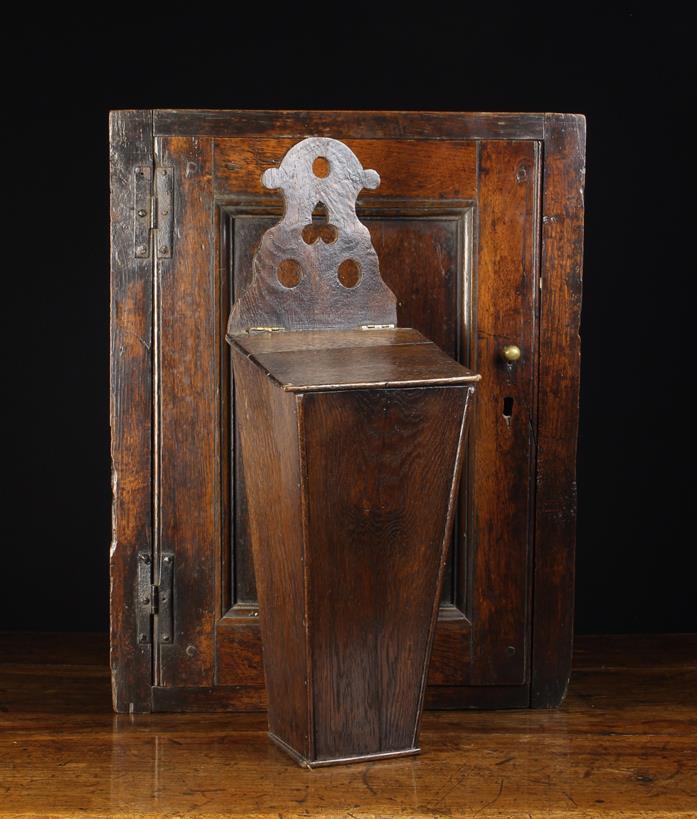 An 18th Century Boarded Oak Candle Box and A Small 18th Century Joined Oak Hanging Corner Cupboard.