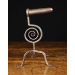 An 18th Century Welsh Wrought Iron Goffering Iron with a coiled scrollwork stem and tripod base
