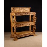 An Imposing Golden Oak Buffet decorated in the 17th century style.