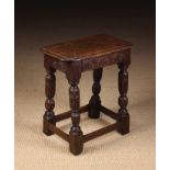 An Elizabethan/James I Oak Joint Stool.