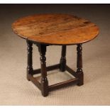 A 17th Century Oak Stool with Table top.