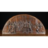 A 17th Century Oak Demi-lune Pediment Panel, carved in relief with a figural scene,