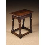 A 17th Century Oak Joint Stool.