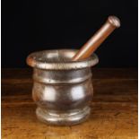 A 17th Century Turned Lignum Pestle & Mortar. The pestle 10½" (27 cm) in length.