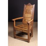 A Good Early 18th Century Walnut & Elm Carved Wainscot Armchair.