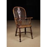 A 19th Century High-backed Windsor Armchair.