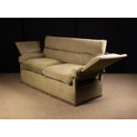 A Knowle Style Settee having a padded box-form back and hinged sides above upholstered arm rests