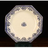 An 18th Century Octagonal Blue & White Tin Glazed Charger painted with a decorative border of