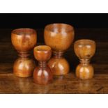 A Graduated Set of Four Fine 18th/19th Century Treen Double-ended Measures of turned cup form with