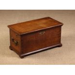 An 18th Century Oak Rent Box of through dove-tailed jointed construction.