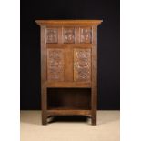 An Antique Joined Oak Romayne Panel Cupboard.