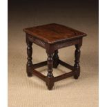 A Charming 17th Century Joined Oak Low Stool.