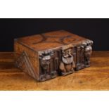 A 19th Century Folksy Oak Box constructed from 17th century timbers with later embellishments.
