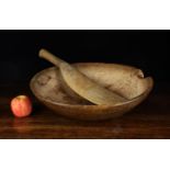 An 18th Century Sycamore Dairy Bowl (A/F) and A Sycamore Cream Stirrer,