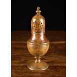 A George III Fruitwood or Sycamore Muffineer