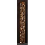 A Late 16th/Early 17th Century Carved Oak Term depicting undulating grape vine with cherubs,