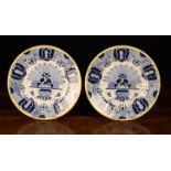 A Pair of Late 18th Century Blue & White Delft Plates decorated with 'Peacock feather' design and