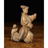 A Small 16th Century Flemish Fragment Carving of an Angel in flowing habit, from a retable carving,