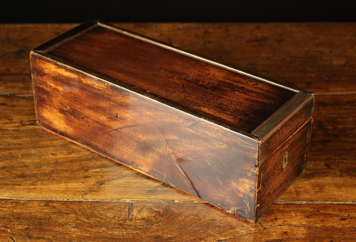 A 19th Century Mahogany Games Box of rectangular form with a brass lined keyhole to one end. - Image 2 of 4