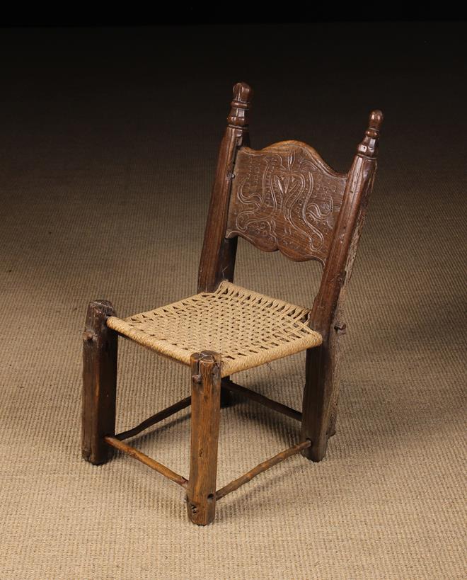 An 18th Century Child's Rustic Chair.