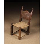 An 18th Century Child's Rustic Chair.