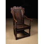 A Good Mid 17th Century Yorkshire Carved Oak Wainscot Chair, attributed to Leeds.