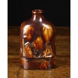 A 19th Century 'Rockingham glaze' Spirit Flask moulded with coal mine to the side,