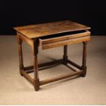 A 17th Century Oak Side Table.