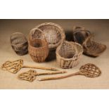 A Group of Five Vintage Wicker Baskets, a Bent-wood Trug, and three Wicker Carpet Beaters.