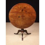 A Fine George III Oak Country Tilt-top Tripod Table.