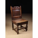 A 17th Century Joined Oak Side Chair probably of Lancashire origin.