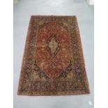 A hand knotted woollen fine Kashan rug, 2.8m x 1.58m