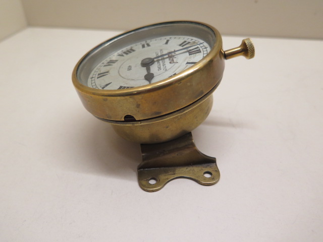 Watford: An early car clock of brass construction with footboard angled mount, the 9cm diameter - Image 2 of 4
