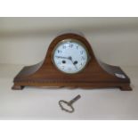 A mahogany mantle clock, 19cm tall, working, polished case, chip to dial