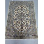 A hand knotted woollen Kashan rug, 1.45m x 1.00m